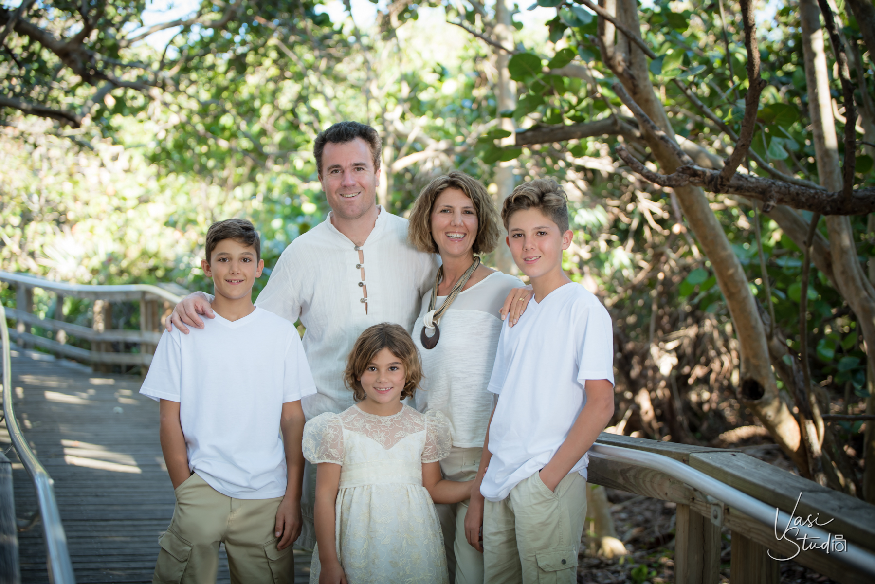 Park and Beach family portrait with pets .