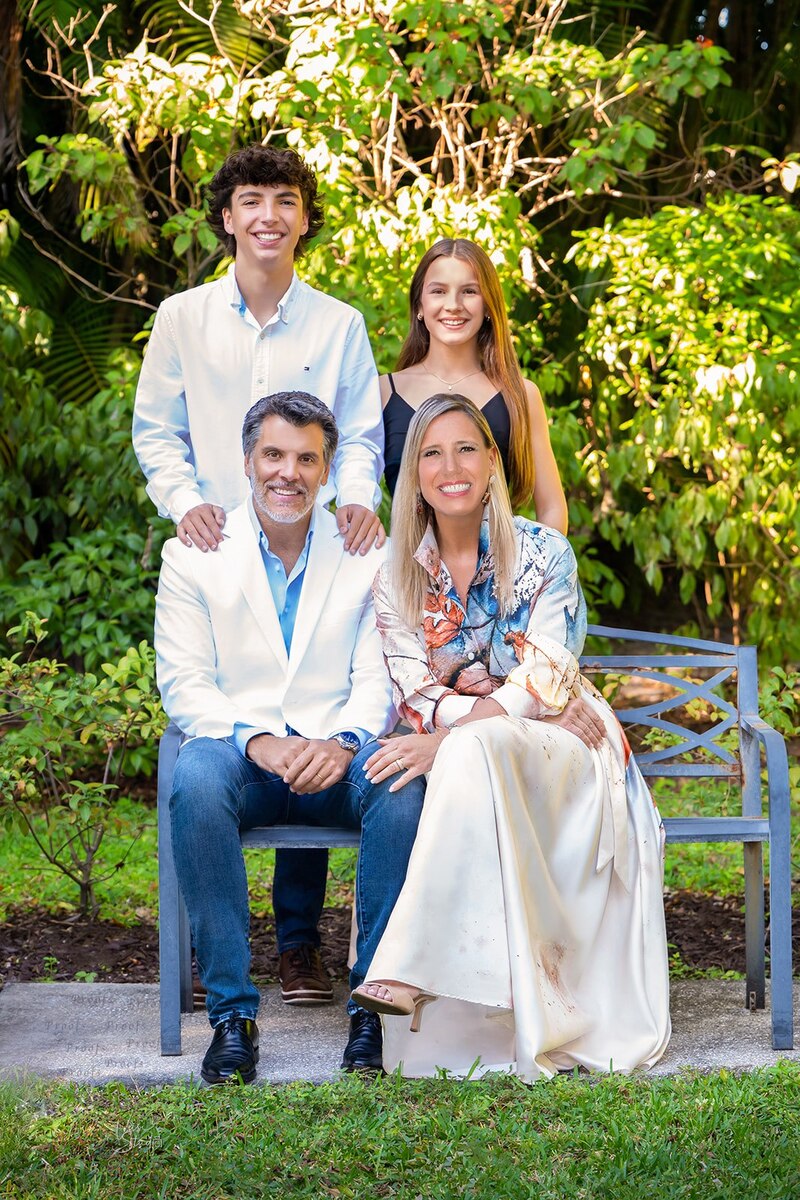 Family and pet photos at a park Palm beach Gardens, Family and pet photographer. Ibis Magazine