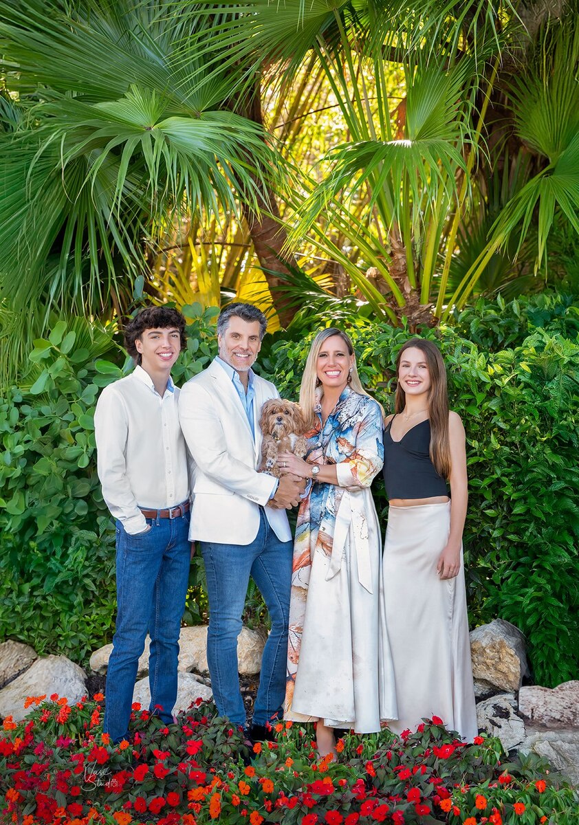 Family and pet photos at a park Palm beach Gardens, Family and pet photographer.