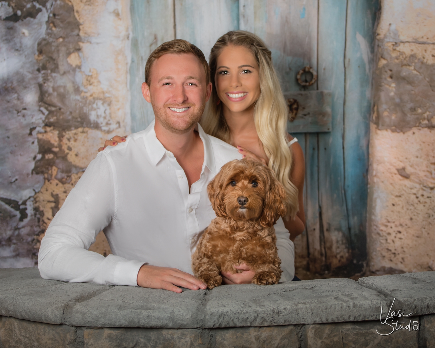 Studio session of a couple and their doggy. Call us today at 561-307-9875.
